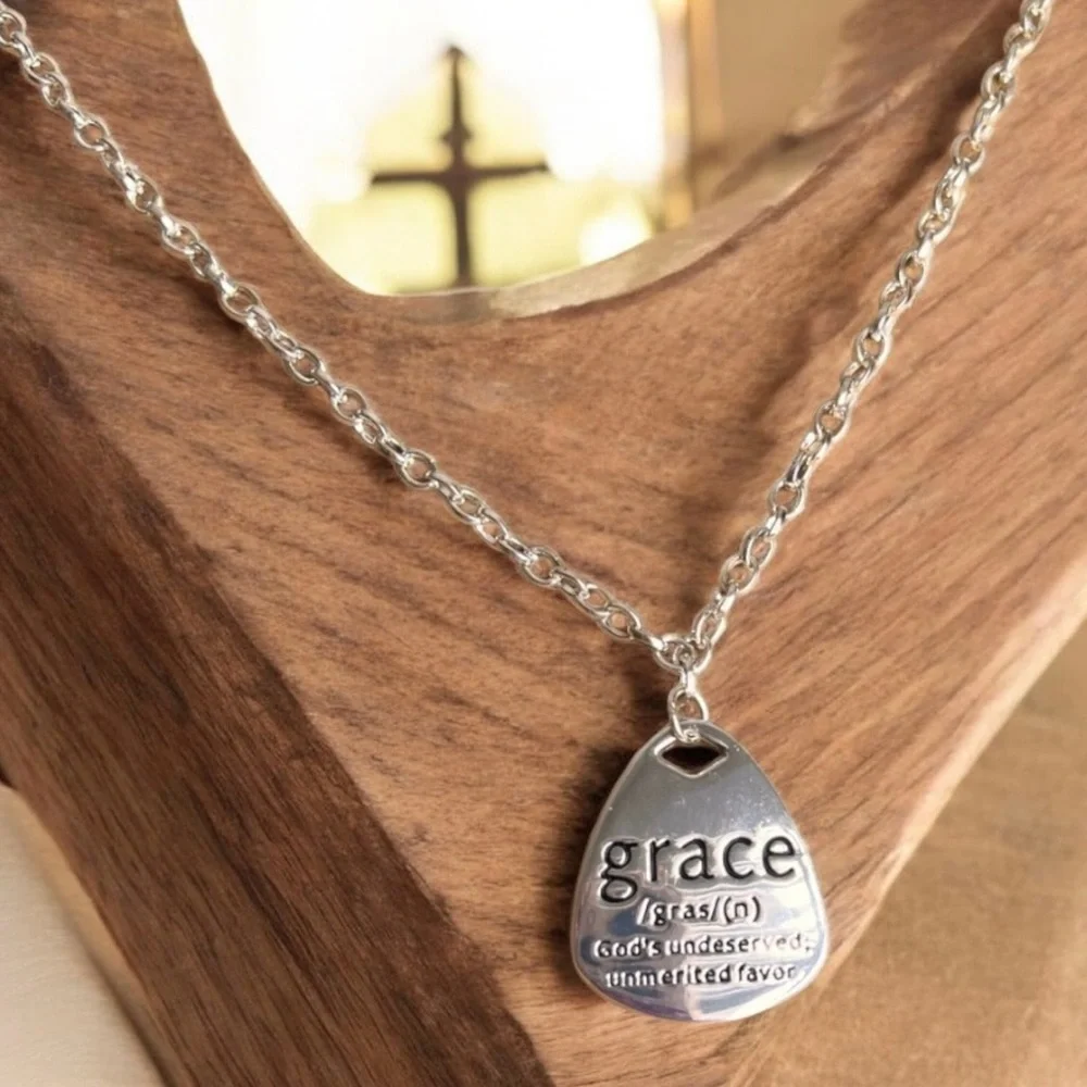 Grace Pendant Necklace in Silver toned and stainless steel. 18” long